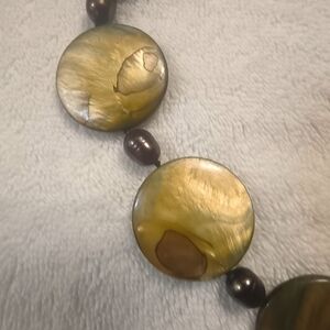 Elegant Gold and Brown Shell Necklace